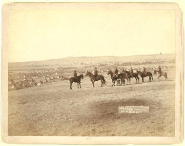 Gen. Miles and staff viewing the largest hostile Indian Camp in the U.S., near Pine Ridge, S. Dak., Jan 16, 1891 - photo and copyright by Grabill, 1891, Deadwood, S.D. LCCN99613903