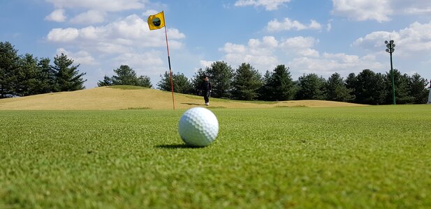Golfers tee if other