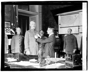 General March receiving first victory medal from Secty. Baker LCCN2016828462 photo