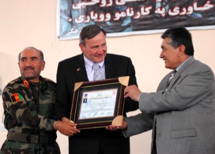 General Mohammad Amayoon Raizee, Deputy of Ministry of Defense, presents an honorary degree (4724612280) photo