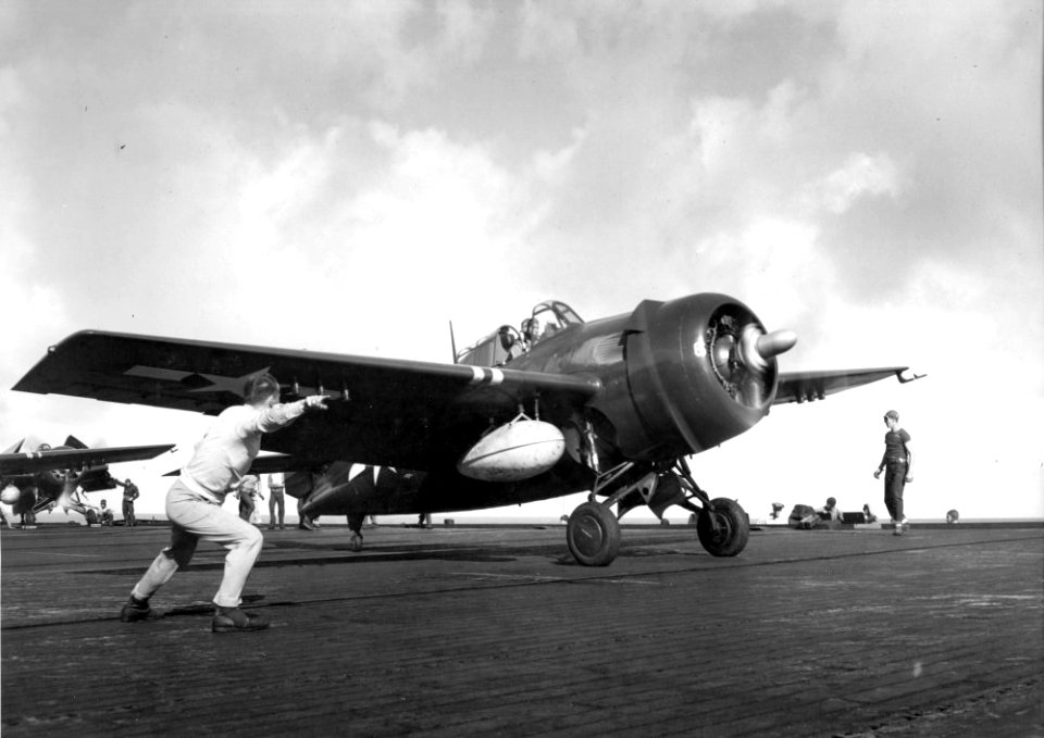 General Motors FM-2 Wildcat is launched from USS Makin Island (CVE-93), in 1945 (NH 94870)