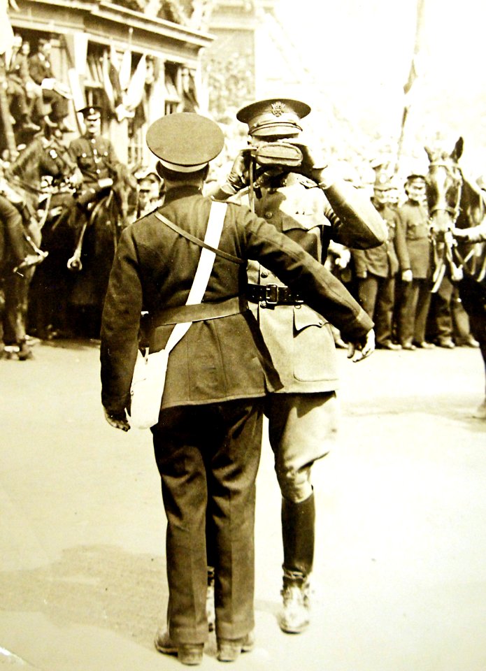 General Pershing accepts a drink from St. John’s Ambulance Brigade member, London, England, 1919 (30091868971)