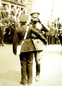 General Pershing accepts a drink from St. John’s Ambulance Brigade member, London, England, 1919 (30091868971)