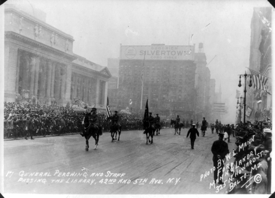General Pershing and staff passing the library (on horseback in parade) 42nd and 5th Ave., N.Y. LCCN2002705817