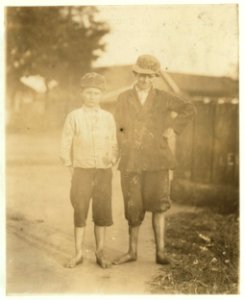 Guy Haywood, 10 years old, helps his brother. Harvey doff(s) in Columbus (Ga.) Mill. LOC nclc.02847
