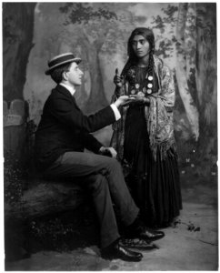Gypsy woman reading man's palm LCCN2003675199