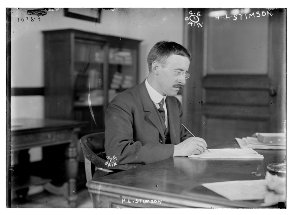 H.L. Stimson at desk writing LCCN2014685253