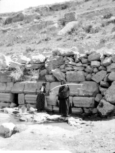 East of the Jordan and the Dead Sea. Circassian women at fountain, Jerash LOC matpc.21980