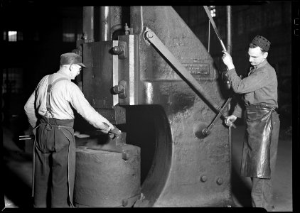 Eddystone, Pennsylvania - Railroad parts. Baldwin Locomotive Works. Blacksmith and helper forging and hammering tools. - NARA - 518727