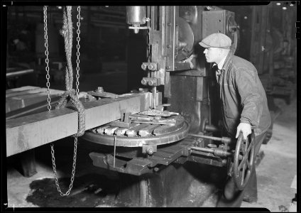 Eddystone, Pennsylvania - Railroad parts. Baldwin Locomotive Works. Machinist shaping a section of a driving-rod for... - NARA - 518711
