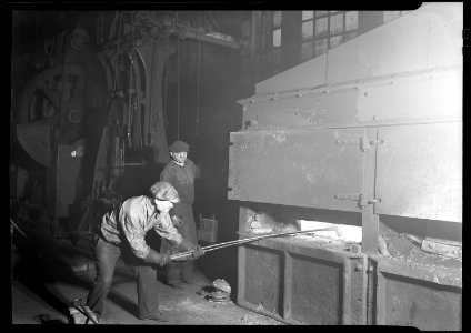 Eddystone, Pennsylvania - Railroad parts. Baldwin Locomotive Works. A modern blacksmith's furnace (or forge) in the... - NARA - 518708