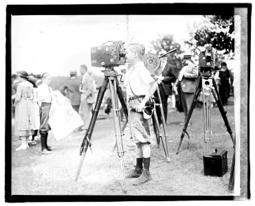 Edwards boy with movie cameras LOC npcc.04701