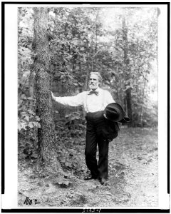 Edwin Markham, full-length portrait, standing, facing left LCCN92514227