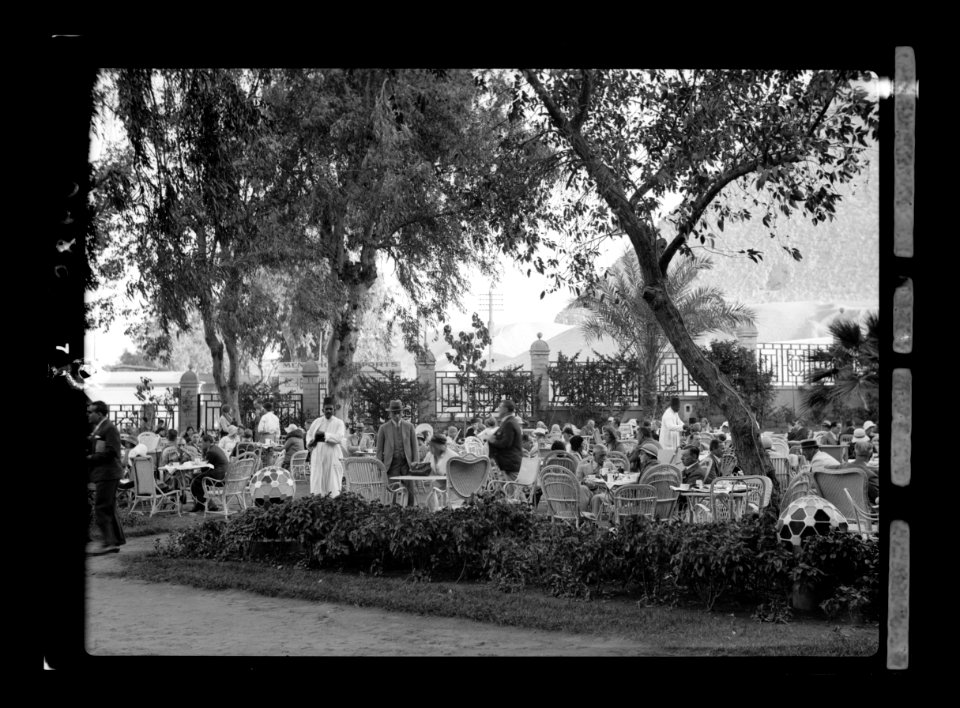 Egyptian Hotels, Ltd, Cairo. Mena House hotel. A garden party. Almost in shade of great pyramid LOC matpc.15593