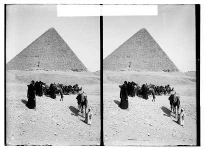 Egyptian views; The pyramids of Gizeh. Caravan of Bedouins at the pyramids LOC matpc.06492
