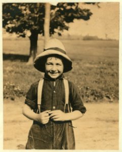 Eight-year old Jack on a Western Massachusetts farm. He is a type of child who is being overworked in many rural districts. See Hine Report, Rural Child Labor, August 1915 LOC nclc.00299