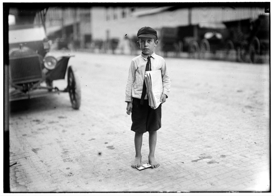 Eight year old newsie. Many youngsters get up early to sell papers. One ten year old starts out at 3 A.M. every day and goes to school. LOC nclc.05524