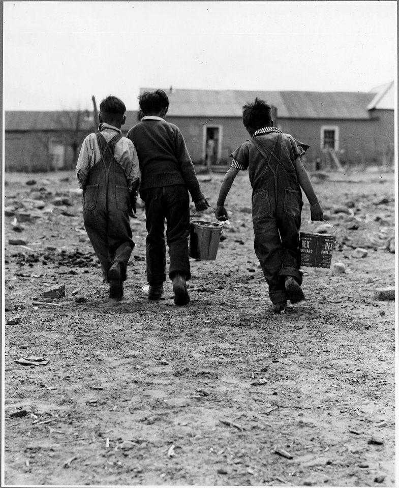 El Cerrito, San Miguel County, New Mexico. Another regular chore is carrying water to the house. E . . . - NARA - 521193