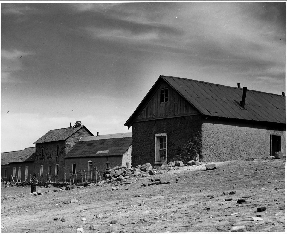 El Cerrito, San Miguel County, New Mexico. Buildings are of many different shapes and sizes. Notic . . . - NARA - 521153