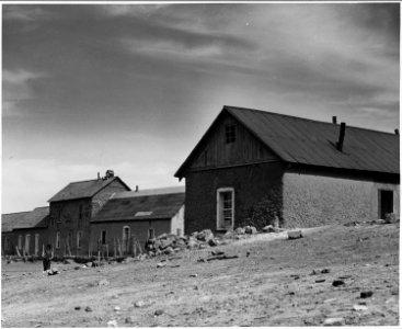 El Cerrito, San Miguel County, New Mexico. Buildings are of many different shapes and sizes. Notic . . . - NARA - 521153