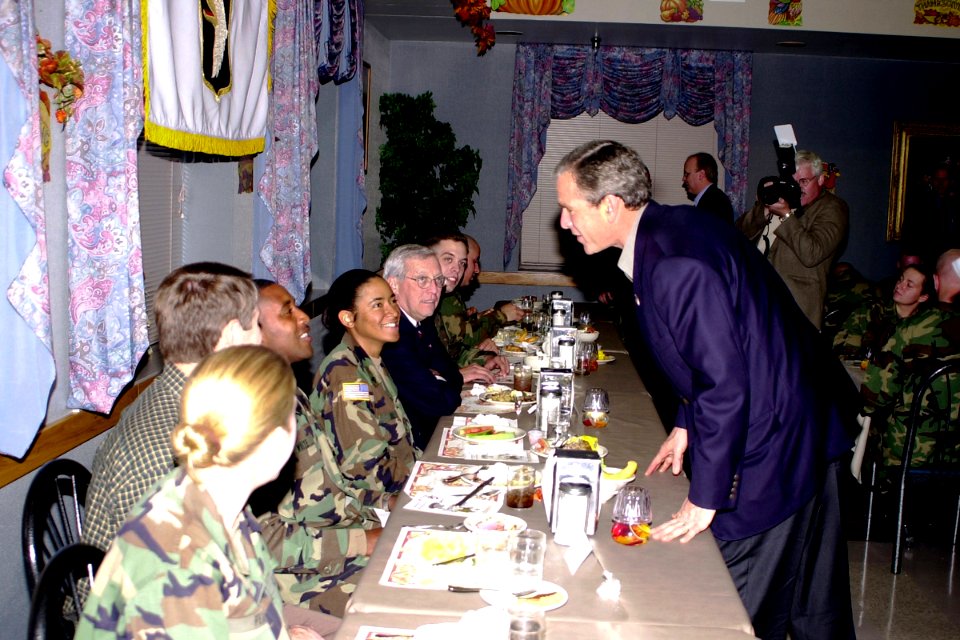 George W. Bush talks to soldiers from the 86th Combat Support Hospital