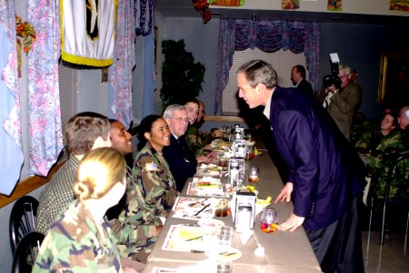 George W. Bush talks to soldiers from the 86th Combat Support Hospital
