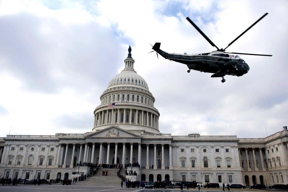 George W. Bush departs US Capitol 1-20-09 hires 090120-N-0696M-103a