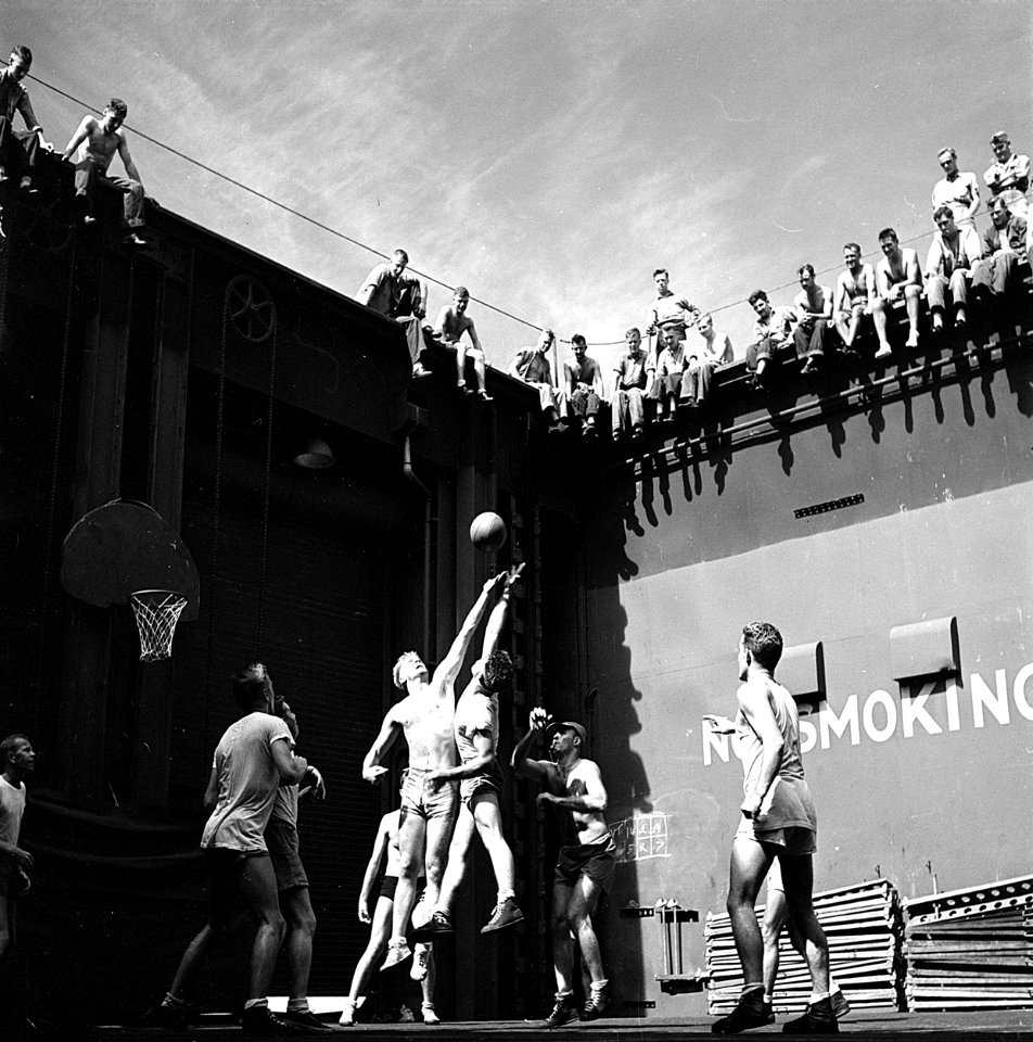 Gerald Ford playing basketball on USS Monterey 06-1944-Darkened Larger