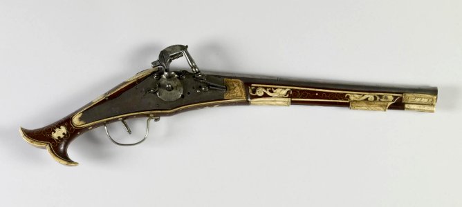 German - Wheellock pistol with inlaid grotesque masks - Walters 51441 - Side B