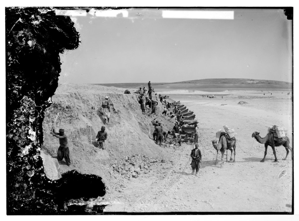 German Baghdad Railway, 190 . Digging into hillside and hauling soil by camels and handcar LOC matpc.04672