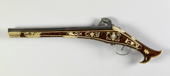 German - Wheellock pistol with inlaid grotesque masks - Walters 51441 - Side A