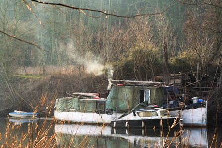River houseboat misty