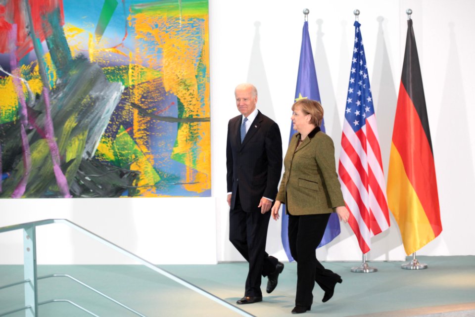 German Chancellor Angela Merkel welcomes Vice President Joe Biden and walks with him before making brief remarks on arrival at the Chancellery (8446827365)