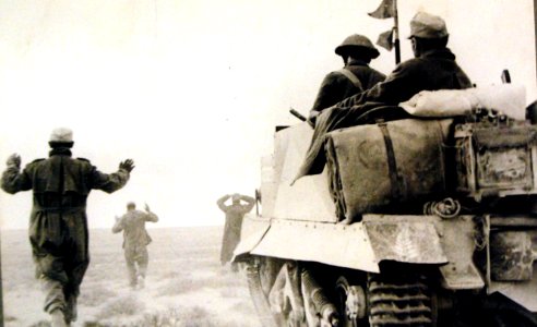 German infantry surrendering to men of a New Zealand Bren Gun Carrier unit, WWII (24332665954)