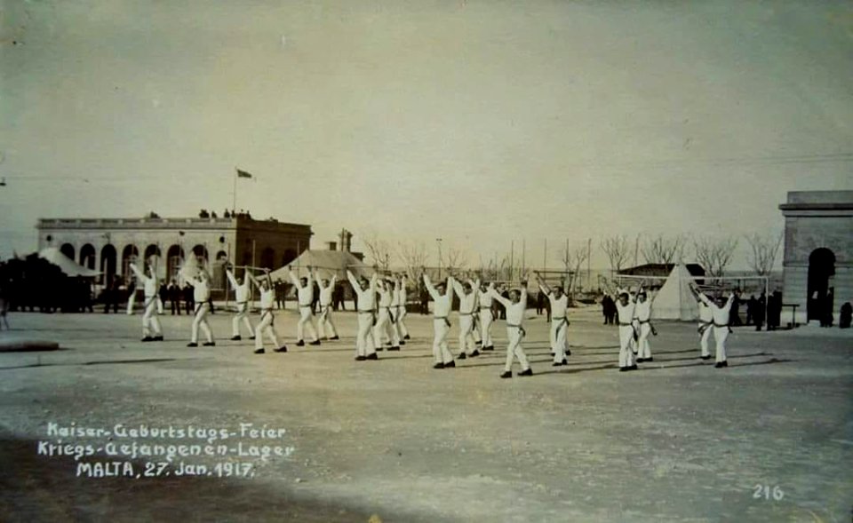 German POWs doing gym exercises for the Emperor's birthday at Verdala Fortress in Cospicua, Malta, 27 Jan 1917 (a)