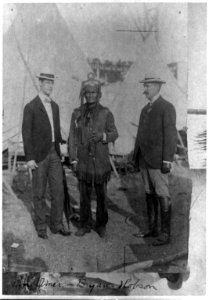 Geronimo and two other men posed standing, full length at Pan-American Exposition, Buffalo, N.Y. LCCN89712957
