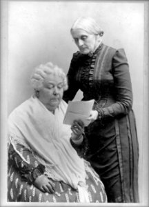Elizabeth Cady Stanton, seated, and Susan B. Anthony, standing, three-quarter length portrait LCCN97500087 photo