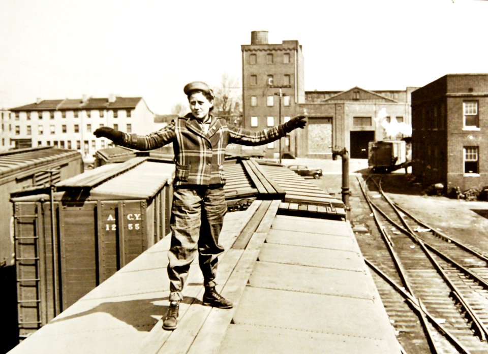Elizabeth McDevitt, employed as a brakeman, signaling train crew members, U.S. embarkation port, WWII (34756902465)
