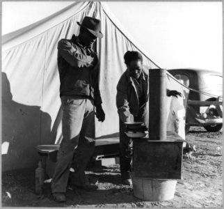 Eloy District, Pinal County, Arizona. (African-American) cotton pickers ready to go to work in the f . . . - NARA - 522021