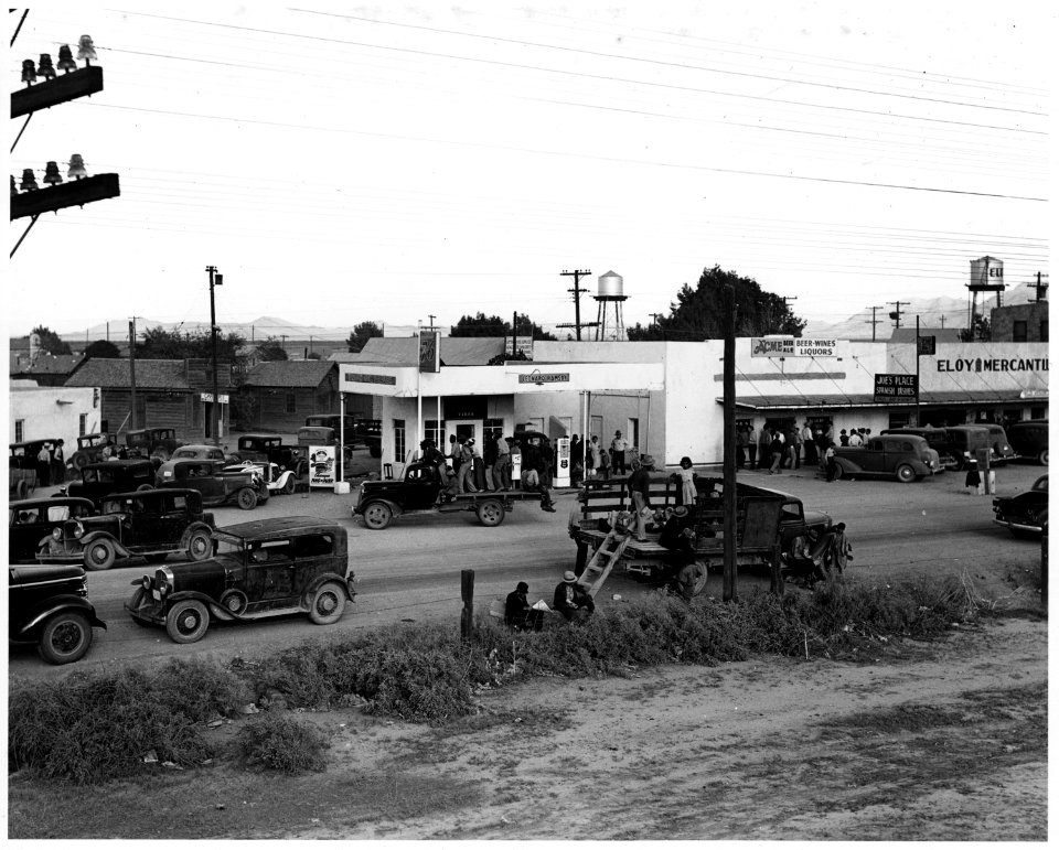 Eloy, Pinal County, Arizona. Main street of a western cotton town on Saturday afternoon during harve . . . - NARA - 522515
