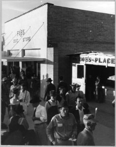 Eloy, Pinal County, Arizona. Crowds of cotton pickers on main street of Eloy late Saturday afternoon. - NARA - 522055