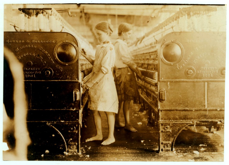 Elsie and Sadie at their machines, Yazoo City (Miss.) Yarn Mills. Both said thirteen years old, but see photo and label 2102. LOC nclc.02100