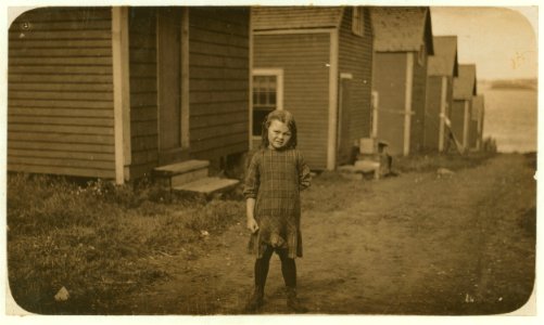 Elsie Shaw, a 6 year old cartoner during the summer, Seacoast Canning Co., Factory -2. Her father is boss of cutting room in Factory -1. He asked me to take some photos of her, as he has her LOC cph.3b37900