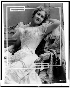 Emilie Grigsby, three-quarter length portrait, seated, facing slightly right LCCN92508444