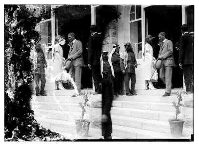 Emir Abdullah (third from left)and Sir Anton Bertram, Chief Justice of Ceylon coming down steps, during reception for Winston Churchill, Government House, Jerusalem LOC matpc.08326