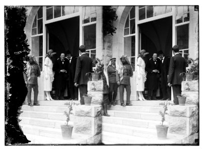 Emir Abdullah (third from left) with Mrs. Churchill and Winston Churchill in doorway receiving Mousa Kasim Pasha el Husseini at reception at Government House, Jerusalem LOC matpc.08804