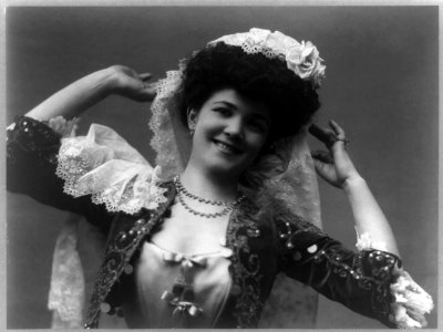 Emma Trentini, half-length portrait in costume, facing front, hands raised LCCN93511630
