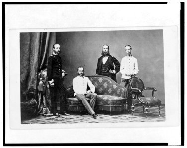 Emperor Maximilian, (standing center with hand on hip) and his three brothers, (left to right) Archduke Karl Ludwig of Austria, Emperor Franz Joseph I of Austria, and Archduke Ludwig Viktor LCCN2005688406