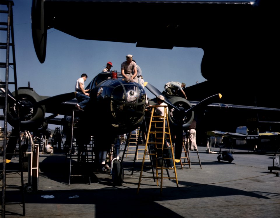 Employees at North American's plant put the finishing touches on another B-25 bomber