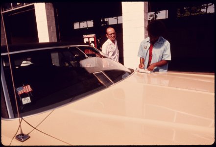 Employee at the Hamilton County Auto Emission Inspection Station at Newtown, Ohio...08-1975 (4265773825)